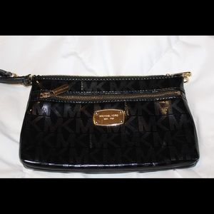 Micheal Kor’s Black Wristlet
